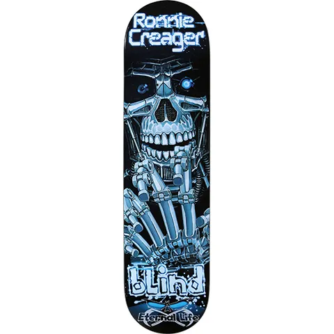 Blind Ronnie Creager Killing Machine skateboard deck: Blue-lit chrome robot skull with glowing eyes and a skeletal mechanical hand raised in front, on a black deck. Ronnie Creager in glowing letters at the nose, Blind and Eternal Life at the tail.