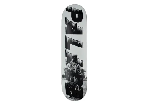 Palace Bankhead White 8.2 skateboard deck: Large black Palace lettering with a ragged, dripping-edge treatment runs vertically down a pale grey deck, overlaid on a black and white photograph of a hooded, camouflaged figure standing in a field.
