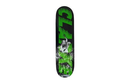 Palace Bankhead Clark Board skateboard deck: Large dripping green lettering reading 'CLARKE' running up the deck over a black and white photo of a figure with horns, on a black deck.