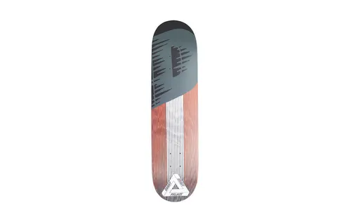 Palace Pro Linear Brady Board skateboard deck: A diagonal split design: the upper section is slate grey with black dripping brush marks, and the lower section has orange-red and white vertical stripes. A white Palace triangle logo with Danny Brady sits at the tail.