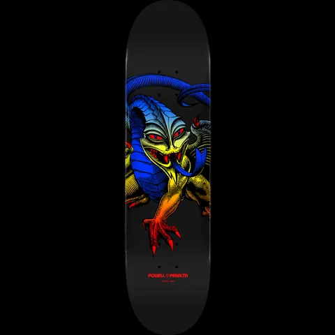 Powell Peralta Cab Dragon Yellow Fade - Shape 248 skateboard deck: A winged, horned dragon with a blue-to-yellow-to-orange fade crouches on a black deck, with red eyes, claws and tongue. Fine line-engraved style.