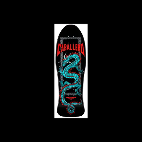 Powell Peralta Caballero Chinese Dragon Black skateboard deck: A teal Chinese dragon with red flame-like details winds down the deck inside a grey Greek-key border, under red CABALLERO lettering, on black. Powell Peralta logo near the tail.