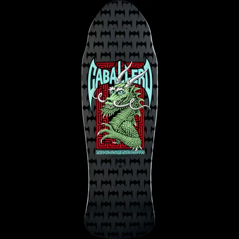 Powell Peralta Caballero Street Silver skateboard deck: A green Chinese dragon with white horns over a red maze-pattern panel, framed by bat-wing lettering of the rider's name, on a grey deck covered in a repeating bat pattern.