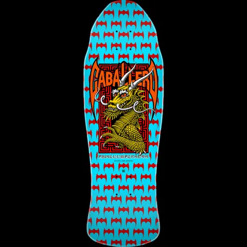 Powell Peralta Caballero Street Blem Blue skateboard deck: A golden dragon head with white horns and whiskers inside a red maze-pattern panel, framed by orange bat-wing style name lettering, on a light blue deck patterned with red bat shapes.