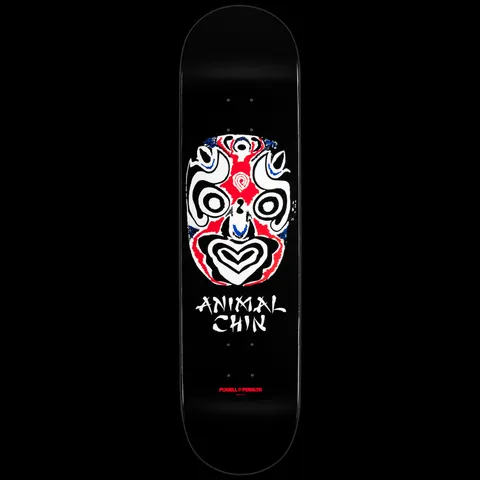 Powell Peralta Chin Mask Black skateboard deck: A stylised opera-style face mask in white, red and black with swirling concentric patterns, above 'Animal Chin' in brush lettering, on a plain black deck.