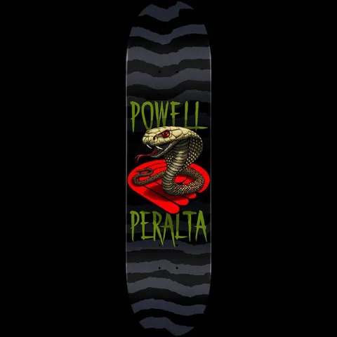Powell Peralta Cobra Green - Shape 247 skateboard deck: A hooded king cobra with red eyes rises from a red coil and Powell Peralta emblem, between large green POWELL and PERALTA lettering, on a black deck with grey torn-stripe patterning.