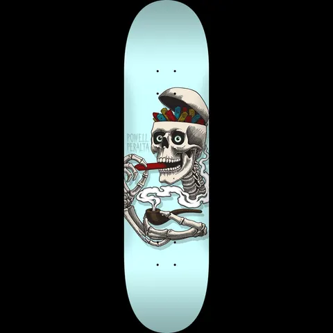Powell Peralta Curb Skelly Blue - Shape 247 skateboard deck: A skeleton with the top of its skull opened like a lid, showing a stack of coloured blocks inside, smokes a red cigar with one hand and holds a smoking pipe in the other. 'Powell Peralta' is vertically printed beside it on a pale blue deck.