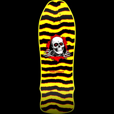 Powell Peralta GeeGah Ripper Blem Yellow - 9.75 skateboard deck: A white skull with red eyes and skeletal claws tears through a red torn background, over yellow and black ragged horizontal stripes on an old-school shaped deck.