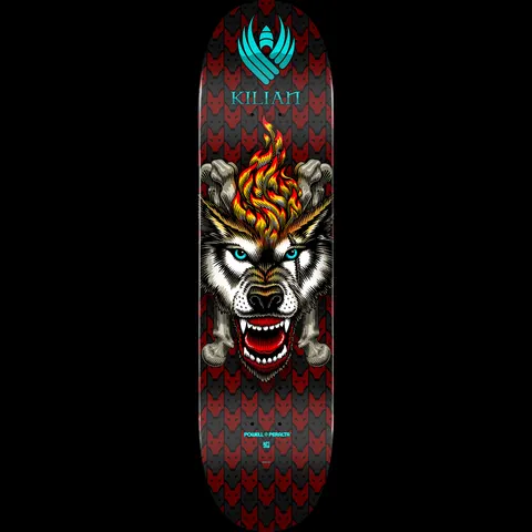 Powell Peralta Pro Kilian Martin Wolf Flight - Shape 242 skateboard deck: Snarling blue-eyed wolf head with a flame on its brow and crossed bones behind, over a repeating red and grey wolf-head pattern, with the teal winged Powell Peralta logo and 'KILIAN' at the top.