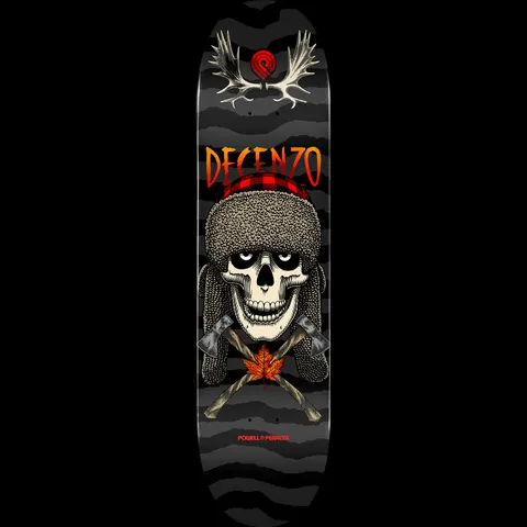 Powell Peralta Pro Scott Decenzo Trapper - Shape 249 skateboard deck: Black and grey streaked deck with a skull wearing a fur trapper hat with a red plaid band, crossed axes and a maple leaf below, and moose antlers above the logo. Rider name in orange gradient at the top.
