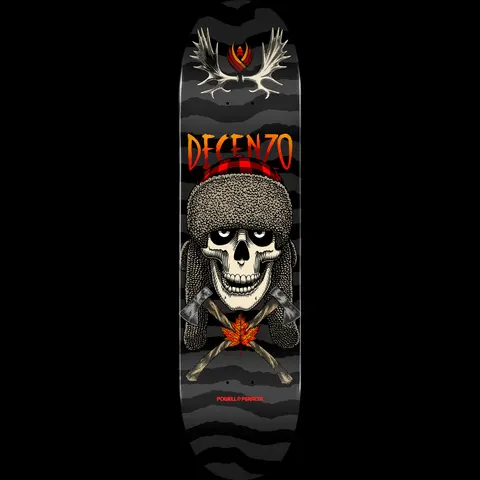 Powell Peralta Scott Decenzo Trapper Flight - Shape 248 skateboard deck: A skull in a fur trapper hat with a red plaid band sits above crossed axes and a maple leaf, with moose antlers and a flame emblem at the top, on a black and grey torn-stripe background.
