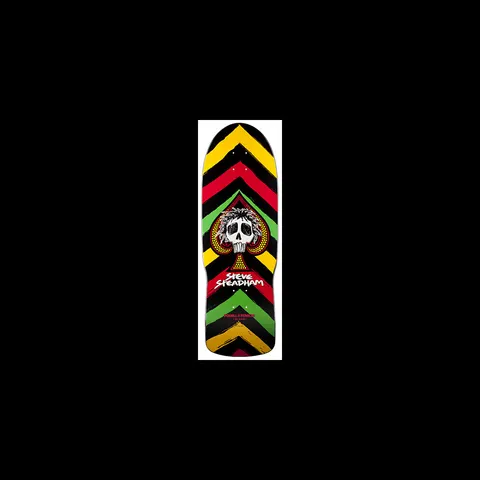 Powell Peralta Steve Steadham Skull n Spade skateboard deck: Old-school shaped black deck with yellow, red and green chevron stripes, centred on a white skull with wild hair inside a spade, with Steve Steadham lettered beneath.