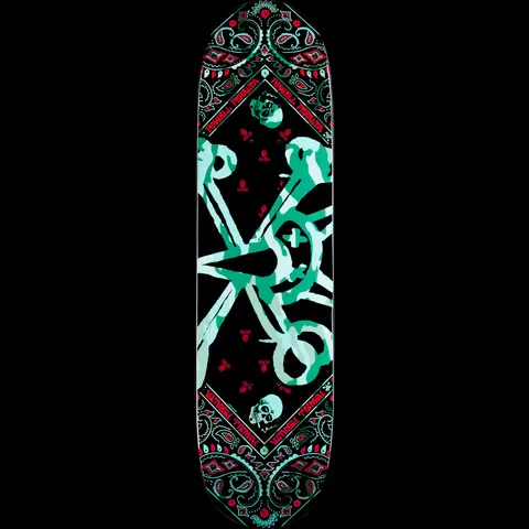 Powell Peralta Vato Rat Band Turquoise skateboard deck: Black deck with a mint green and white skull and crossbones in a rough camouflage-like texture, framed by a diamond-shaped paisley bandana border with small skulls.