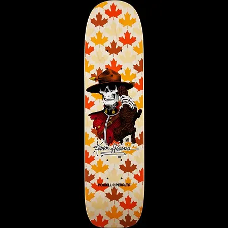 Powell Peralta Kevin Harris Mountie Freestyle Natural skateboard deck: A skeleton dressed as a Mountie in a red tunic and brown campaign hat, holding a brown bear cub, on a natural wood deck covered in a repeating pattern of autumn maple leaves in oranges, reds and yellows.