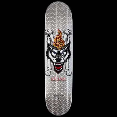 Powell Peralta LIGAMENT Pro Kilian Martin Wolf 2 skateboard deck: Silver chain-link patterned deck showing a snarling wolf head with blue eyes and a flame on its brow, set against crossed bones, with the rider name beneath in red.