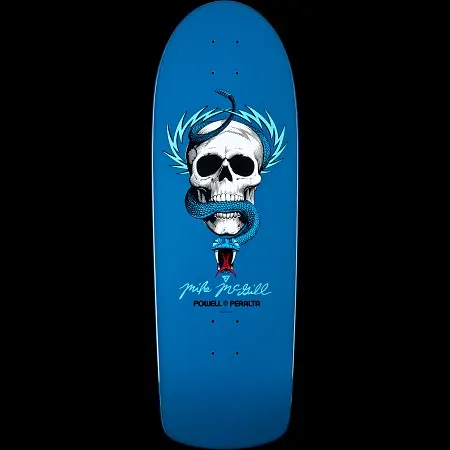 Powell Peralta Mike McGill Skull and Snake Blue skateboard deck: White skull with a blue snake coiled through it and lightning bolts fanning out behind, with a cursive signature and Powell Peralta logo below, on a blue old-school shaped deck.