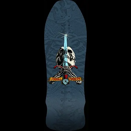 Powell Peralta Rodriguez Geegah Skull and Sword skateboard deck: Old-school shaped deck with a skull pierced by a glowing blue sword held by skeletal hands, under a gold banner with the brand name, over a faint tonal ribcage and skull pattern in blue-grey.