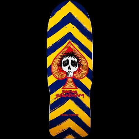 Powell Peralta Steve Steadham Skull and Spade Blue/Yellow skateboard deck: Old-school shaped deck with navy and yellow brush-stroke chevrons, a red and yellow ace of spades containing a white skull with dark hair, and the rider name in red script beneath.