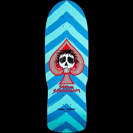 Powell Peralta Steve Steadham Skull and Spade Aqua/Blue skateboard deck: A red spade studded with jewel-like dots frames a white skull with spiky black hair, over brushy zigzag chevron stripes in two shades of blue. Rider name in red brush lettering below.
