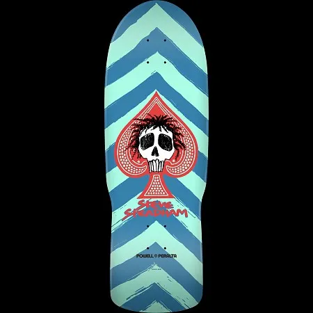 Powell Peralta Steve Steadham Skull and Spade Aqua/Blue skateboard deck: A white skull with scruffy black hair sits inside a red spade symbol on an old-school shaped deck. Bold brushed zig-zag chevrons in aqua and blue run behind it, with the rider's name beneath.
