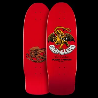 Powell Peralta Caballero Dragon II - Red skateboard deck: A golden winged dragon with a curled tail clutches a banner, with the name in large white 3D lettering beneath it on a red deck. Signature and brand text sit below, and the underside shows a brown dragon.