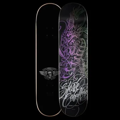 Powell Peralta Caballero Pin Stripe Dragon - Black skateboard deck: A pinstripe-style ornamental dragon drawn in purple and green flourishes on a black deck, with the rider's name in large silver calligraphic script across the lower half. The underside shows a winged skull logo.