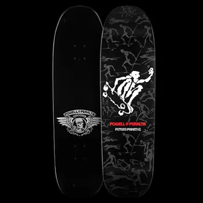 Powell Peralta Future Primitive - Black skateboard deck: A white skeletal skater in a mid-air grab stands out on a black deck covered with faint grey figures skating and falling. Powell Peralta and Future Primitive text sit below in red and white. The underside shows a winged skull logo.