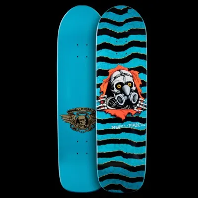 Powell Peralta Graffiti Ripper - Blue skateboard deck: A skull in a gas mask tears through the deck surface, with skeletal hands gripping the torn orange edges. Wavy blue and black ripped stripes cover the deck, and the underside shows a winged skull logo on plain blue.