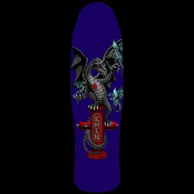 Powell Peralta Hydrant Dragon - Purple skateboard deck: A grey winged dragon with a red mark on its chest perches on a red fire hydrant with vertical Asian-style characters, with small teal dragons flying around. Printed on a deep purple old-school shaped deck.