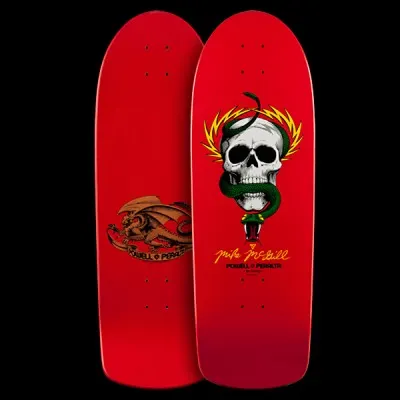 Powell Peralta McGill Skull & Snake - Red skateboard deck: A white skull with a green snake coiled through it and yellow lightning bolts behind, on a red deck. The rider's signature and Powell Peralta text sit below, and the underside shows a brown dragon.