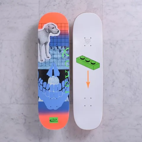 Quasi Darknet Red Fade skateboard deck: Collage of a wireframe-textured dog cut-out, a blue grid and a blue skeleton skull with upturned jaw, on an orange-to-blue gradient. The underside shows a green toy brick with an orange arrow on white.