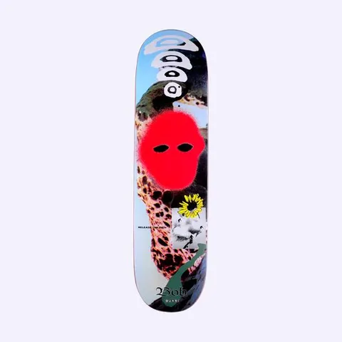 Quasi de Keyzer Iowa skateboard deck: Collage of a blue sky and pitted rock face, with a red spray-painted blob with eye holes like a mask. A grey stacked circle motif sits at the top, a yellow sunflower and small photo inset below, and Bob in gothic script at the foot.