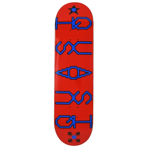 Quasi Unicode skateboard deck: Red deck with large blue outlined, angular pixel-style lettering running down the length, mirrored top and bottom around a central ornamental glyph. Small black star and burst symbols sit at each end.