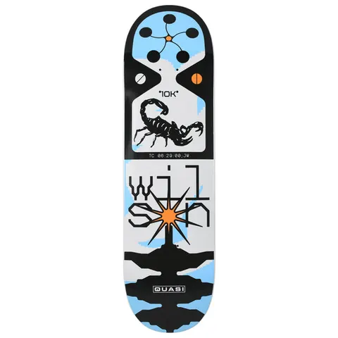 Quasi Wilson Y2K skateboard deck: Black, white and pale blue deck with a scorpion in a framed panel with a 10K label and timecode, a button cluster at the nose, and rider name in angular pixel lettering above an orange starburst. Quasi logo at the tail.