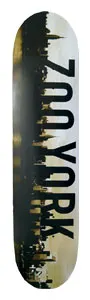 Zoo York Reflection skateboard deck: A dark New York skyline silhouette runs down the left of a cream deck, with ZOO YORK in large black capitals reading down its length. The sky has a sepia, smoky tone.