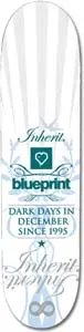 Blueprint Cursive White skateboard deck: White deck with pale grey radiating stripes and ornate blue scrollwork. Script lettering, a teal heart logo box, the Blueprint name and a slogan sit centrally, with a large faded script word and infinity symbol near the tail.