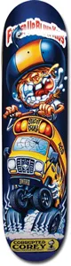 Blind Corrupted Corey skateboard deck: Cartoon of a snarling, helmeted rider with wild hair driving a cracked-windscreen yellow school bus with oversized tyres, in a gross-out sticker-card style on navy. A banner at the bottom names the rider.