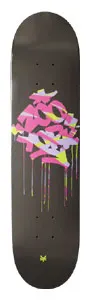 Zoo York Fat & Juicy skateboard deck: A graffiti-style tag in pink, lilac and neon yellow with paint drips running down, on a dark charcoal deck. A small yellow logo sits at the tail.