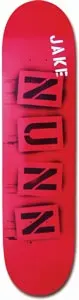 Think Nunn Aerosol skateboard deck: Red deck with the rider's surname NUN spelt out in four stencilled black letter blocks stacked down the board, with JAKE in white capitals near the nose and spray marks behind.