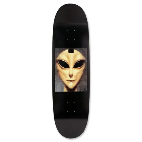Skateboard Cafe Harry Ogilvie Entity - Rugby Shape Black skateboard deck: Painted portrait of a pale alien face with large black eyes, in a grey-bordered panel on a plain black deck. Small Cafe signature in the corner of the picture.