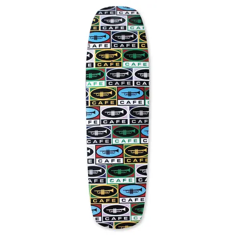 Skateboard Cafe Trumpet Collage Cruiser skateboard deck: An all-over repeating pattern of oval trumpet logos above the word CAFE, in tiles of blue, green, yellow, black and white, covering a shaped cruiser deck.