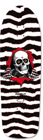 Powell Peralta Ripper (Blem) skateboard deck: A skull with amber eyes and skeletal hands tears through a red rip in the deck, which is covered in jagged black and white torn-paper stripes with red edging. Small Powell logo below.