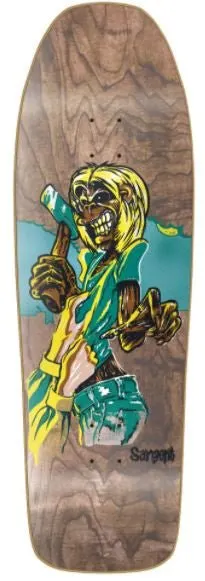 New Deal Danny Sargent Killer skateboard deck: An illustrated skeletal-faced figure with long blonde hair, grinning and holding an axe while pulling open a green shirt, against a teal patch on a stained woodgrain deck. Sargent signed at the bottom.