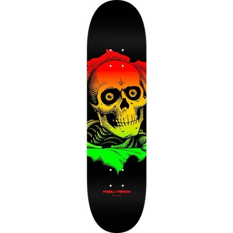 Powell Peralta Ripper Rasta Fade 249 skateboard deck: A skull with large round eyes bursts from a torn hole above skeletal ribs, filled with a fade from red through orange and yellow to green, on a black deck.