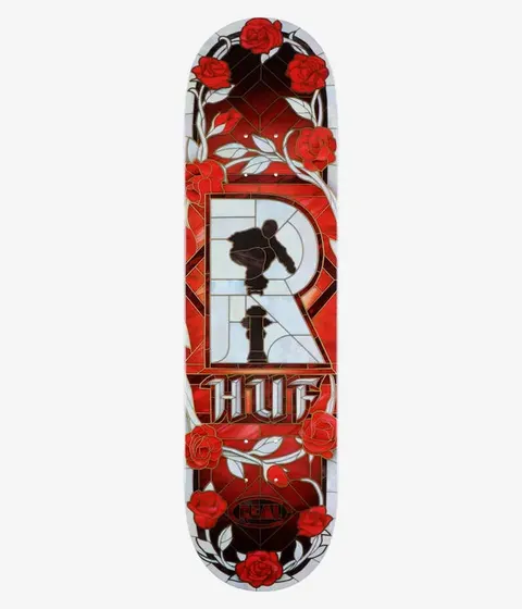 Real HUF Cathedral skateboard deck: Stained-glass window design in reds and pearly white: a large R containing a silhouetted skater over a fire hydrant, framed by roses and thorny stems, with 'HUF' in gothic letters below.