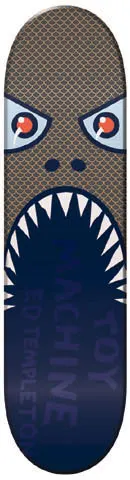 Toy Machine Bite skateboard deck: Cartoon monster face with red and white eyes, scaly brown skin and a wide open mouth of white teeth fading to navy. Toy Machine and Ed Templeton are printed faintly in the mouth.