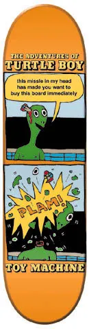 Toy Machine Turtle Boy skateboard deck: Orange deck laid out as a two-panel comic strip: a green turtle with a missile in its head speaks in a bubble, then a yellow 'PLAM!' explosion below. Title at the top and brand name at the bottom.