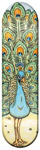 Zero Peacock skateboard deck: Painted peacock facing the viewer with its tail fanned out behind, in teal, green and orange feather detail, standing on pale sand.