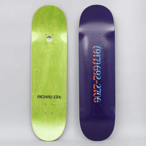 917 17 8.38 Chrome Dialtone Slick Blue skateboard deck: A telephone number in ornate serif numerals with red and blue chrome-style shading on a deep purple deck. The other deck shows the same number in black on a green underside.