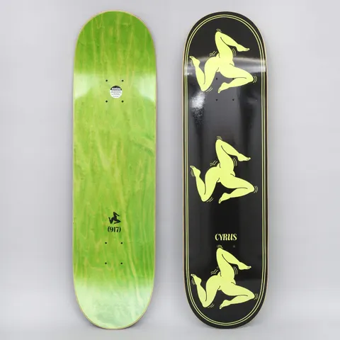 917 17 8.5 Cyrus Legs Black skateboard deck: Black deck with a double pinstripe border and three pale yellow triskelion figures of three bent legs running down the deck, with CYRUS lettering near the tail. The green underside has a small leg logo and (917).